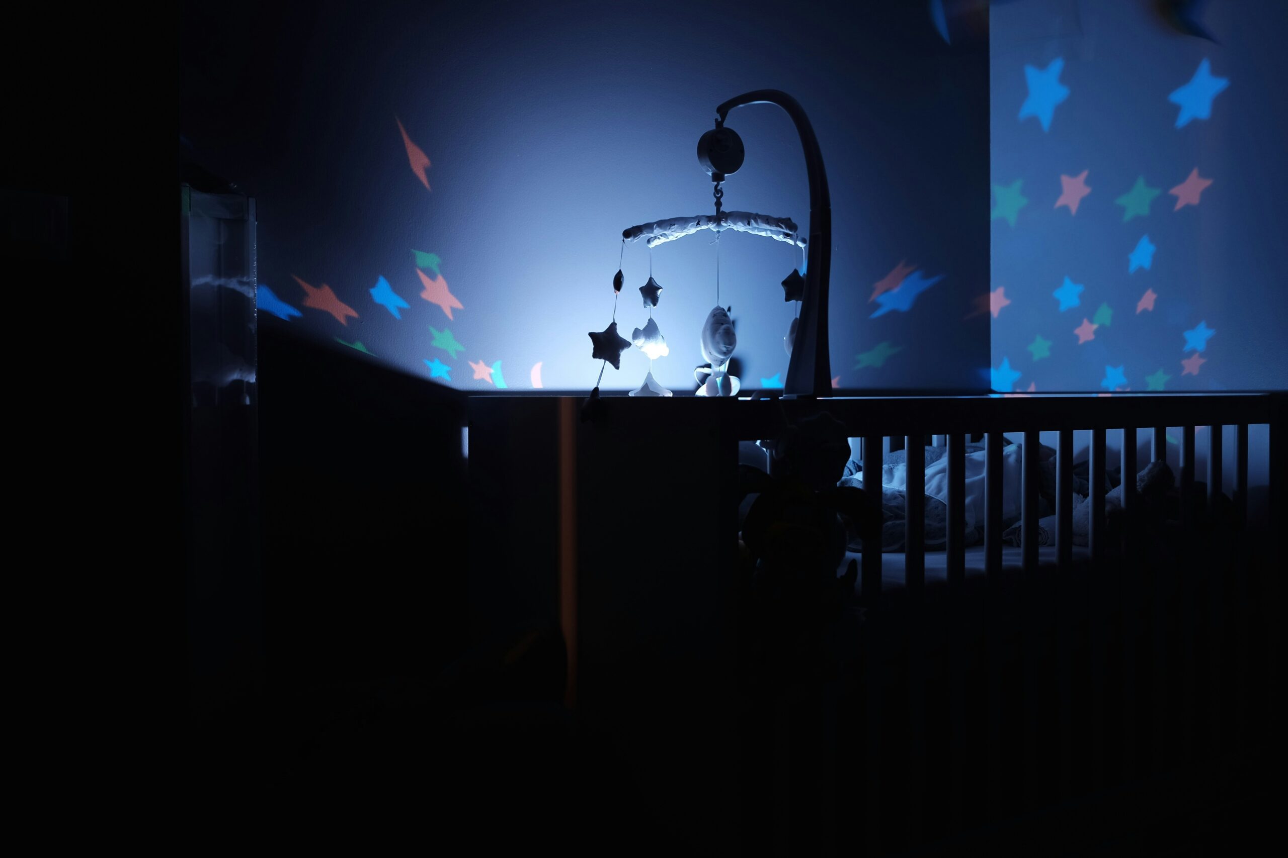 Gentle baby sleep routine with low light and soothing environment