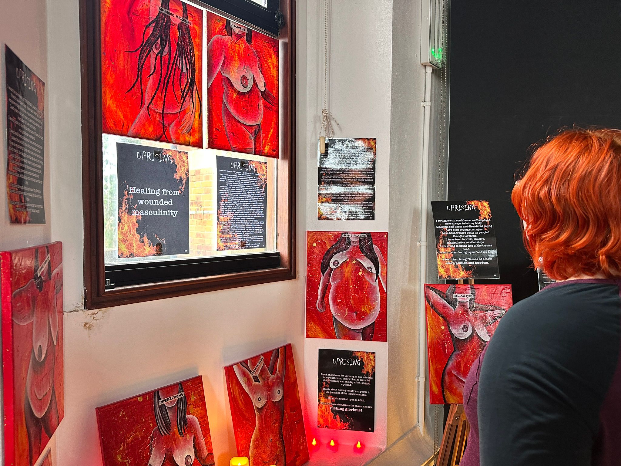 Artwork display at the UPRISING International Women’s Day art exhibition by Kat Shaw
