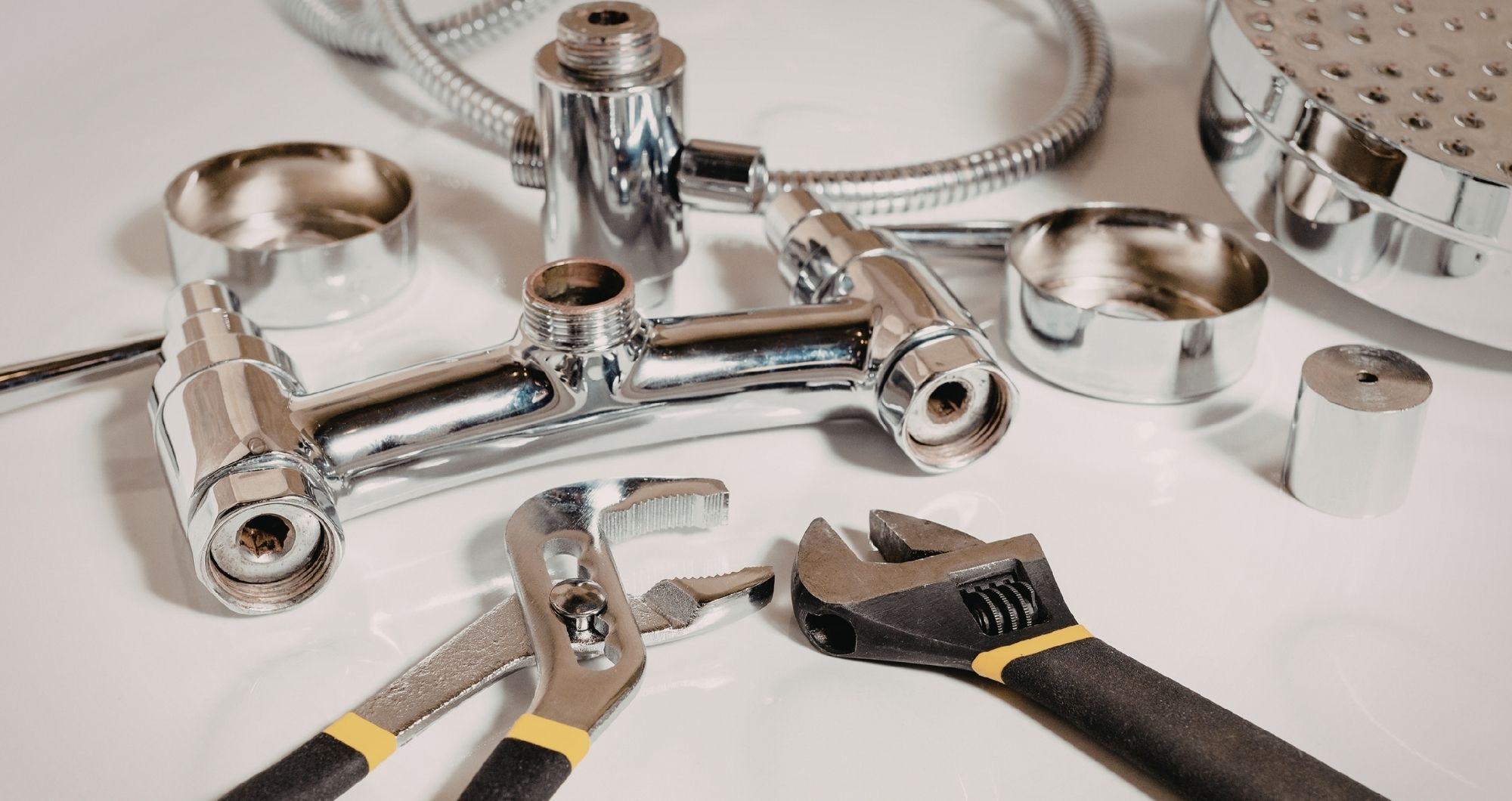 When should you call a professional for plumbing issues?