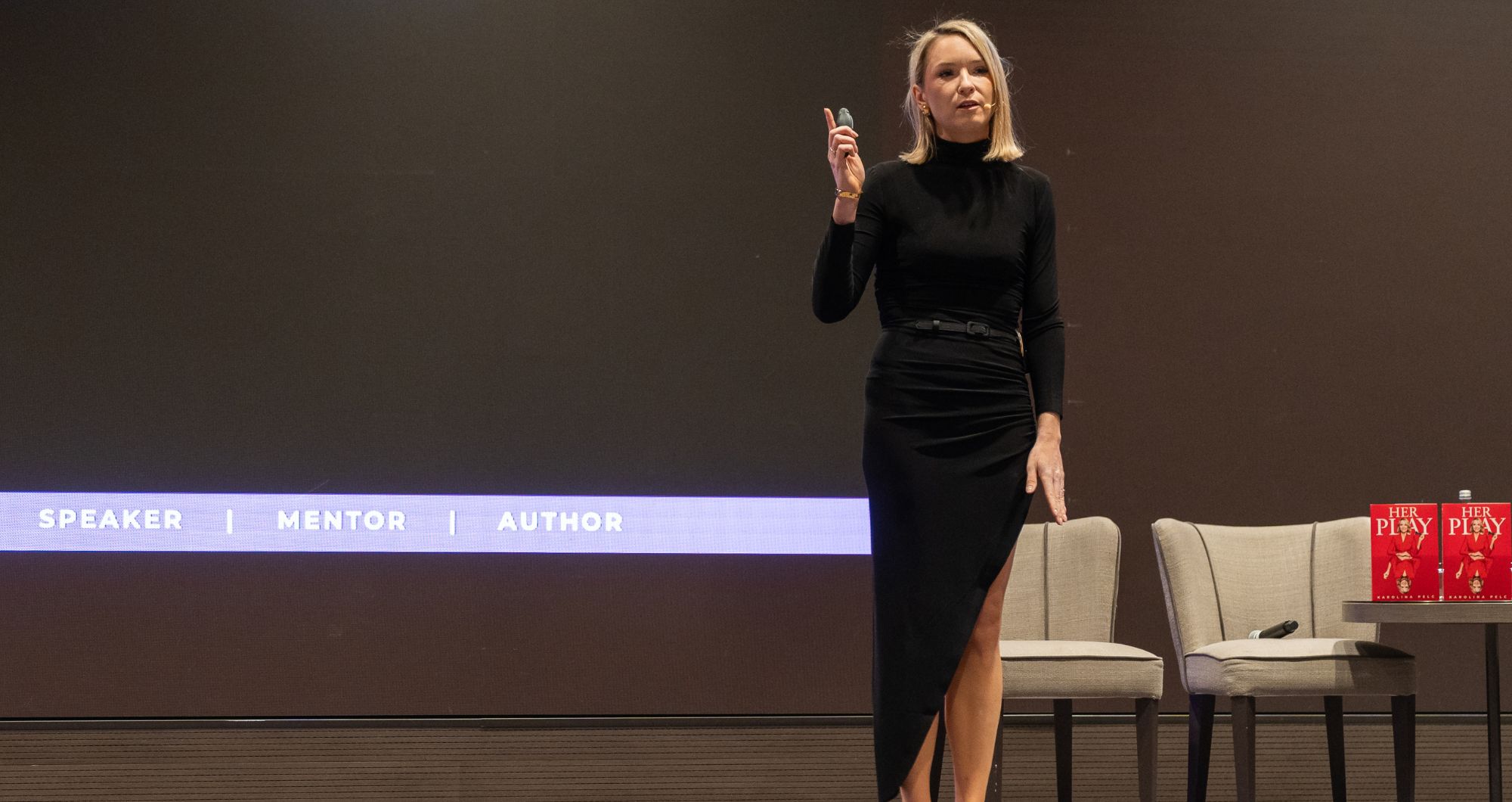 Karolina Pelc founder, author and mentor gives keynote presentation at conference for entrepreneurs