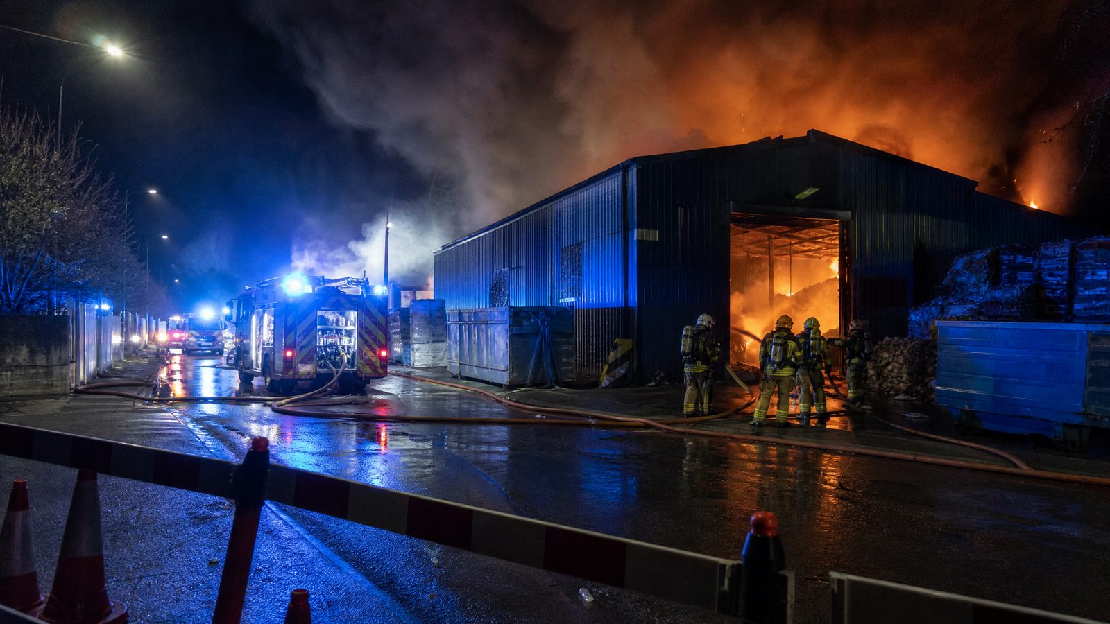 Brixton waste-site blaze shuts roads as 60 firefighters battle 70‑tonne fire; residents urged to avoid area and keep windows closed