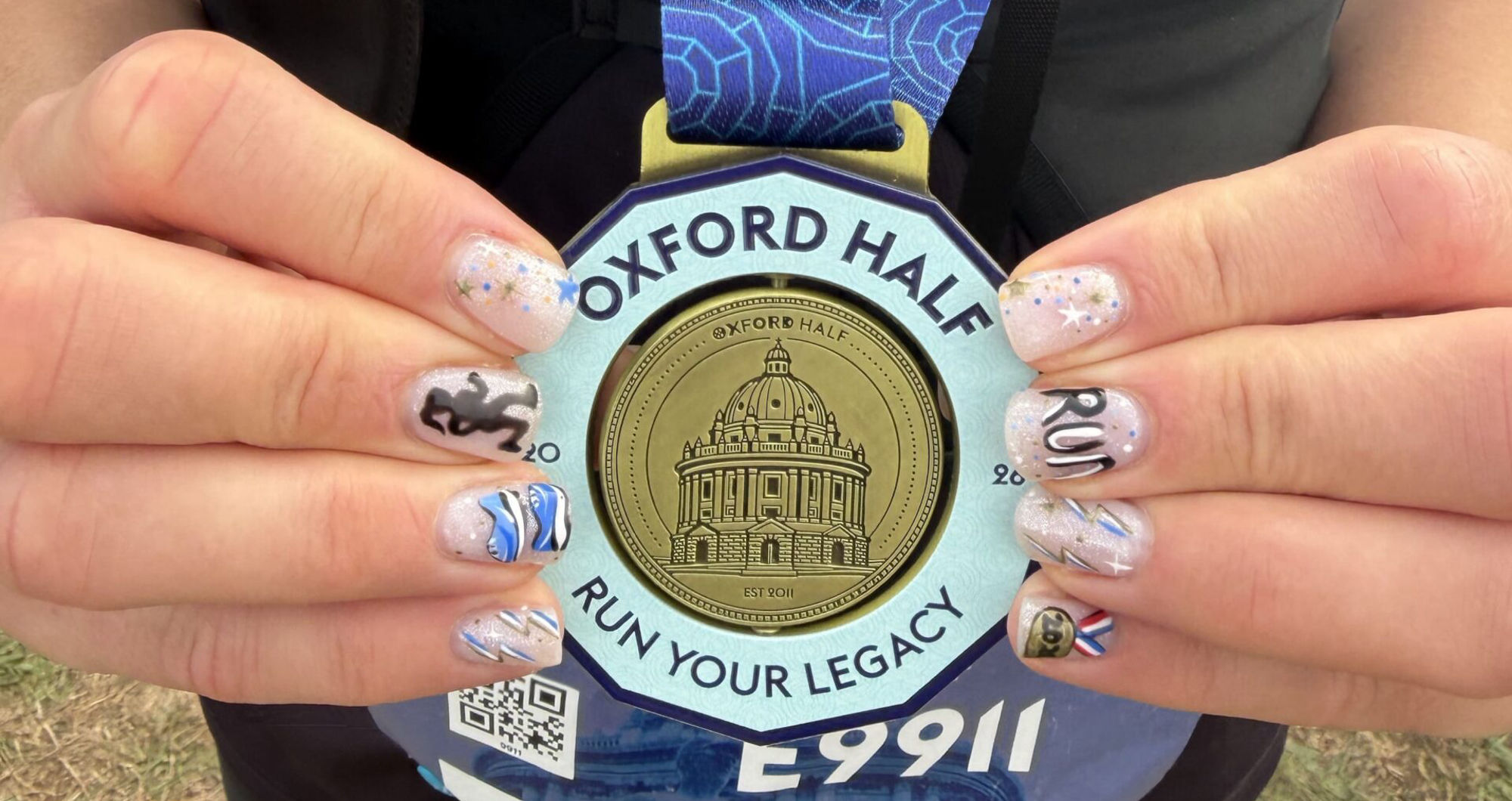 Patients cheer on Thame audiologist as she runs Oxford Half Marathon for dementia charity